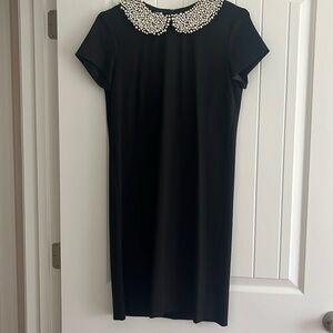 Black dress with pearl collar